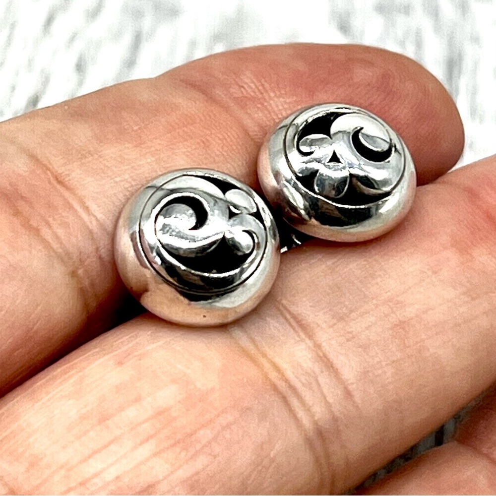 196. Silver Plated Post Earrings With Floral Motif. 1/2” Diameter.